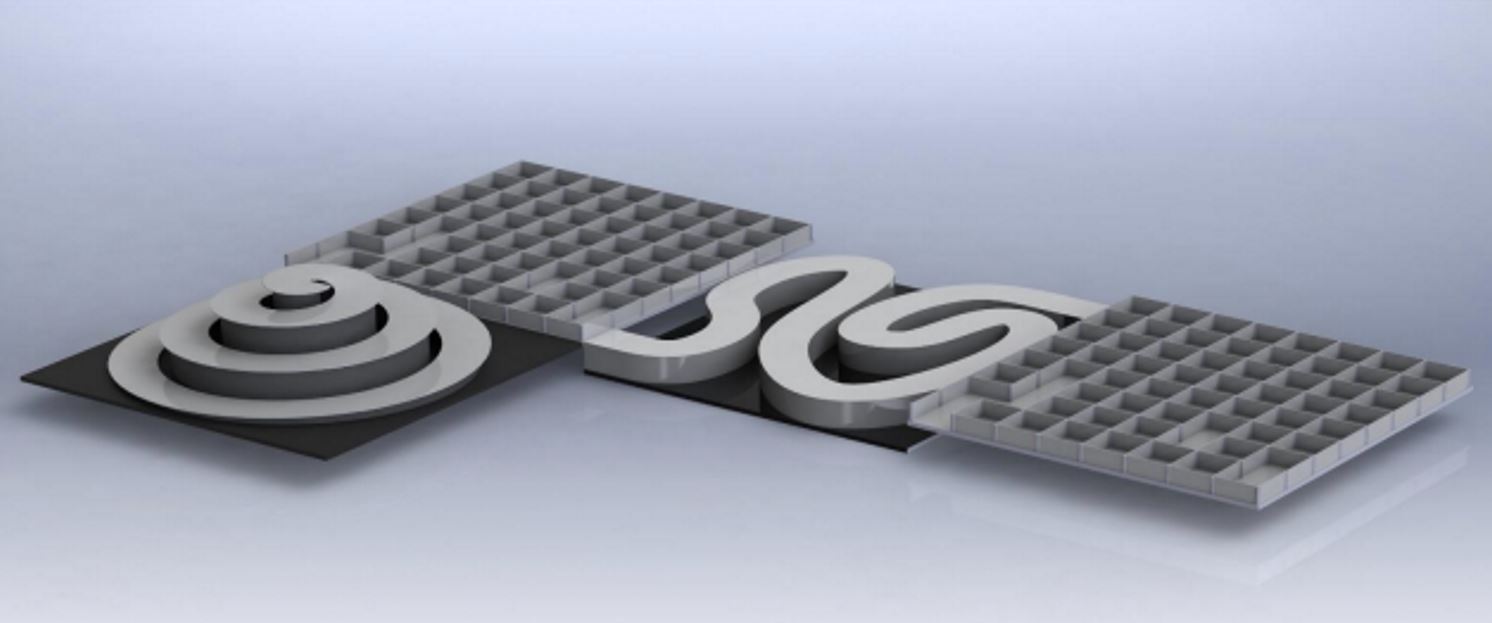 Overview of the physical micromouse obstacle course showing the maze, causeway, and spiral sections