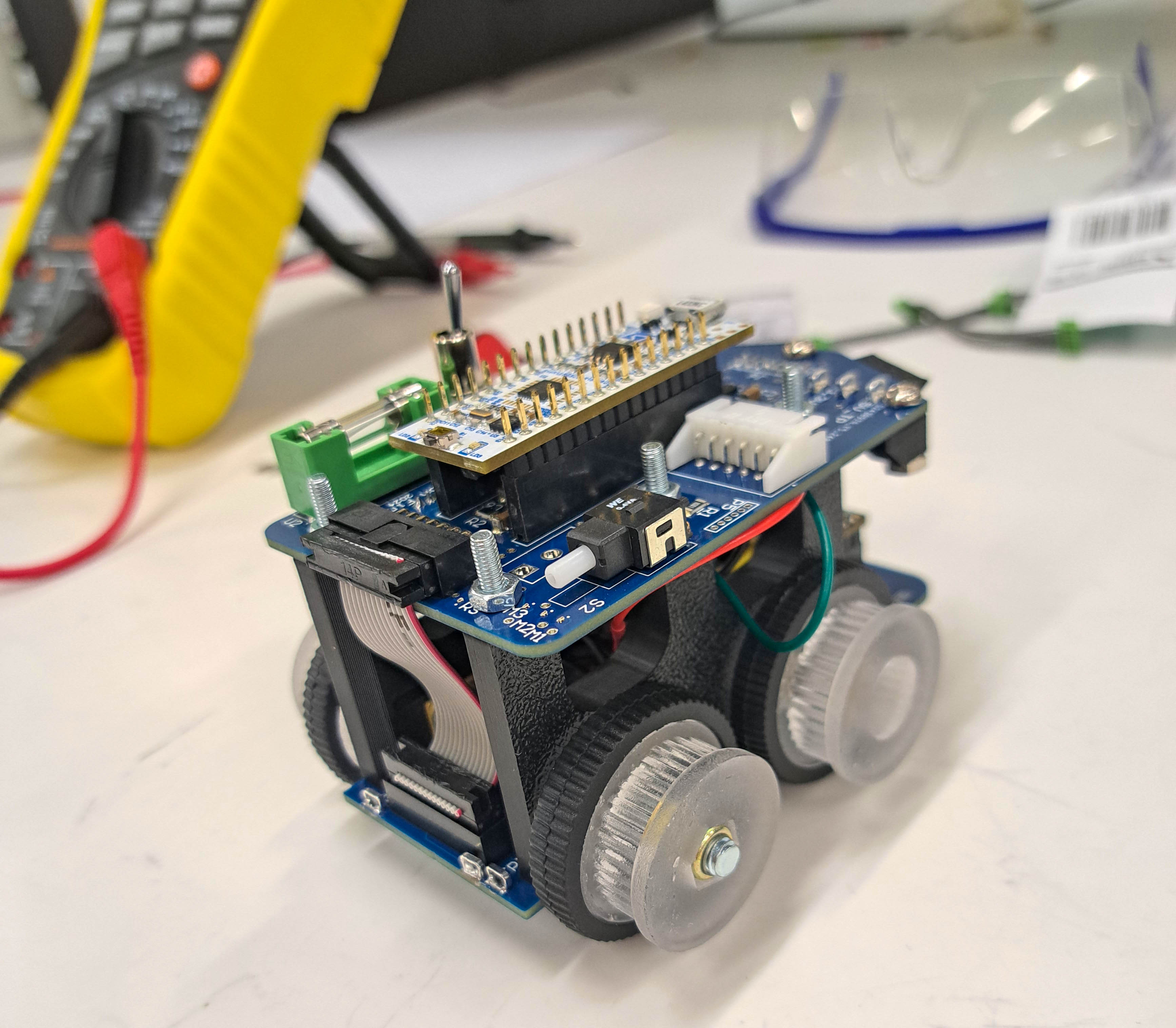 Final assembled Theseus 3 robot showing the two-level body structure and compact electronics layout