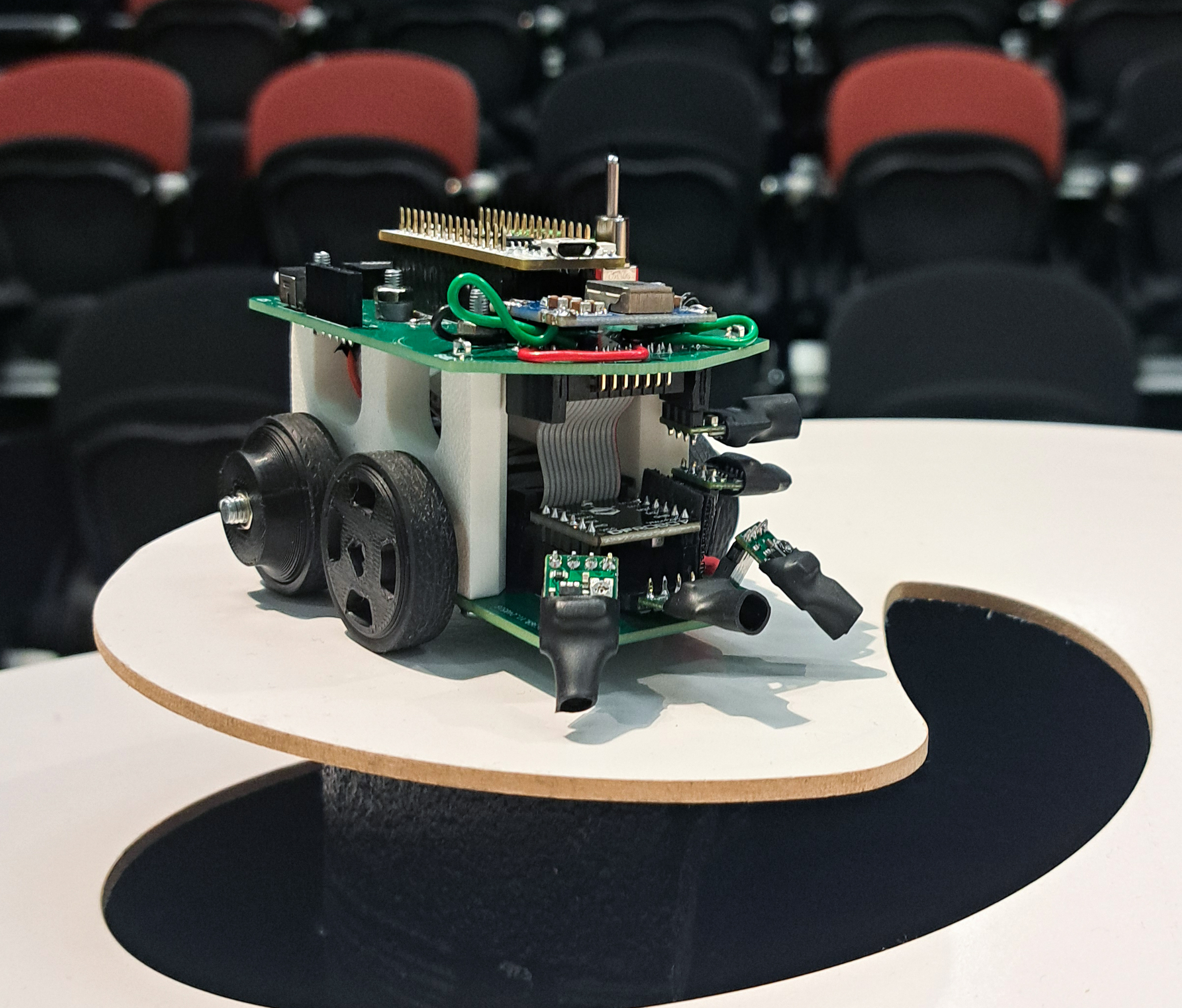 Final image of Theseus 3 on the obstacle course, representing the completed micromouse project