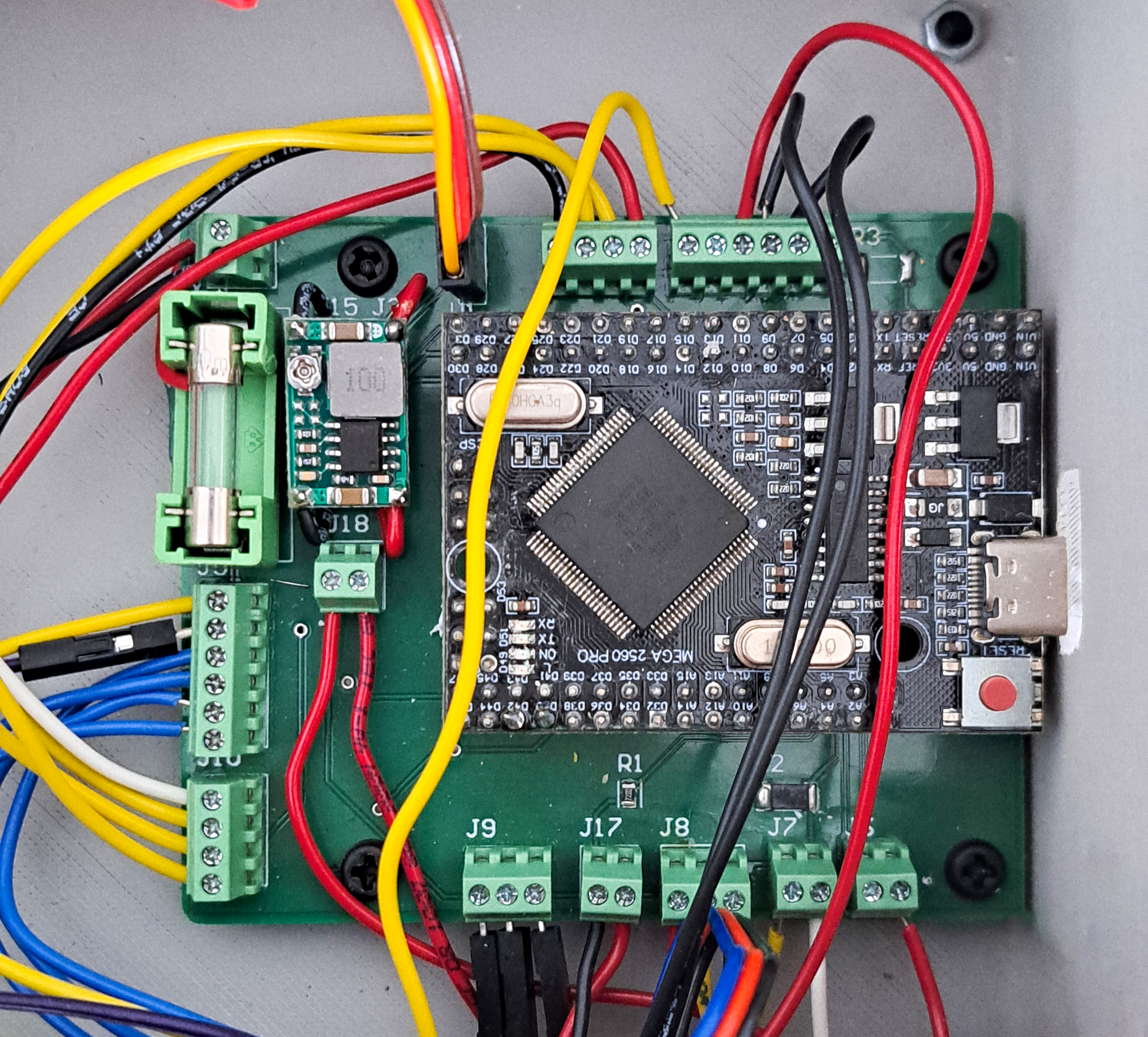 Close-up of the Arduino Mega Pro mounted on the custom interface PCB